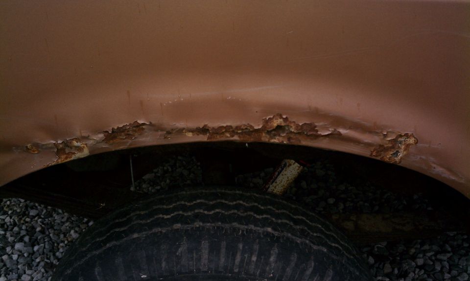 Rear drivers side rust, common to Fords of this model year.
