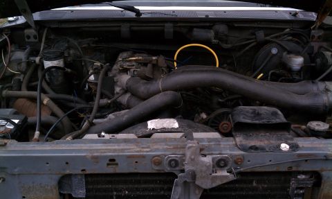 1990 Ford Bronco - Front view of 351Windsor with stripped front end.