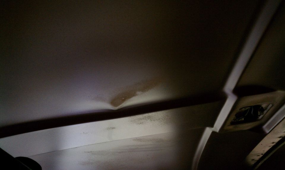 Interior roof without headliner.