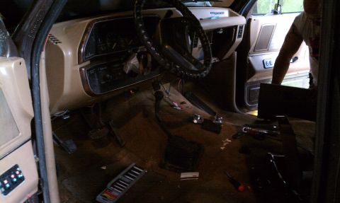 1990 Ford Bronco - Taking out original seat and paneling.