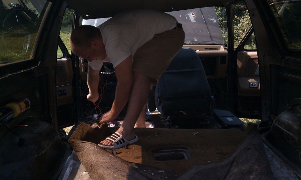 My Bro clearing out the old carpeting.