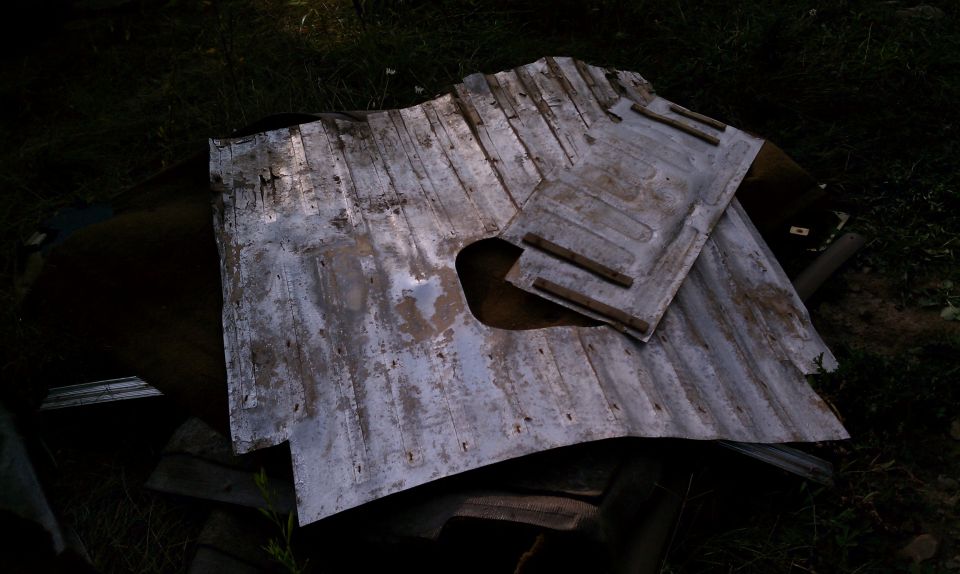 Old cargo area heat shield.