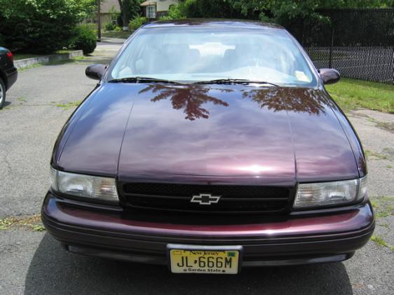 Maroon 1994 Chevrolet sedan front view with New Jersey license plate JL-666M