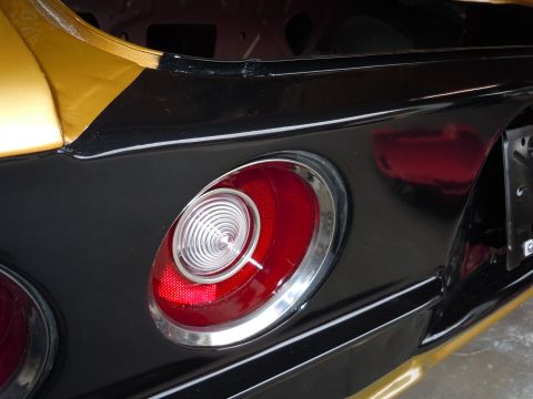 1970 Chevrolet Camaro - Close-up of a 1970 Chevrolet Camaro's distinctive oval tail light and rear quarter panel.
