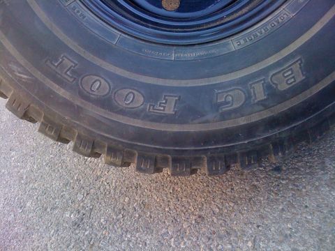 1987 Suzuki Samurai - Tire detail showing "BIG FOOT" branding and tread pattern.