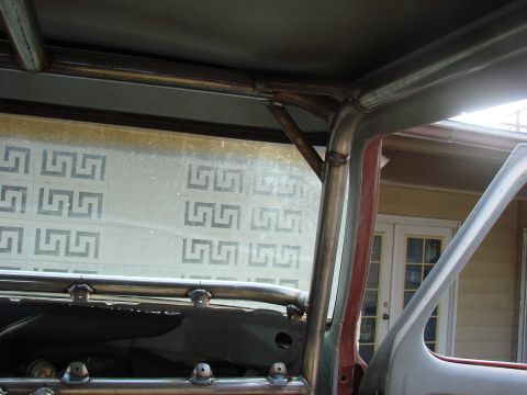 1979 Ford Bronco - Custom roll cage tubing is welded into place inside the vehicle's interior.