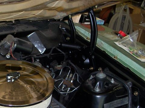 1971 Ford Ranchero - Close-up of engine bay components including air cleaner and hood hinges.