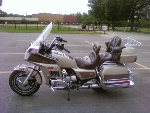 1989 Ford Bronco - This Honda Gold Wing motorcycle features a large fairing, comfortable seating for two, and ample storage.