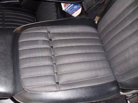 1969 Chevrolet Camaro - Interior view of a 1969 Chevrolet Camaro, showing the patterned seats and a visible ACDelco box.