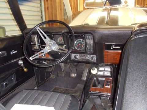 1969 Chevrolet Camaro - Interior view of a 1969 Chevrolet Camaro, highlighting the dashboard and console details.