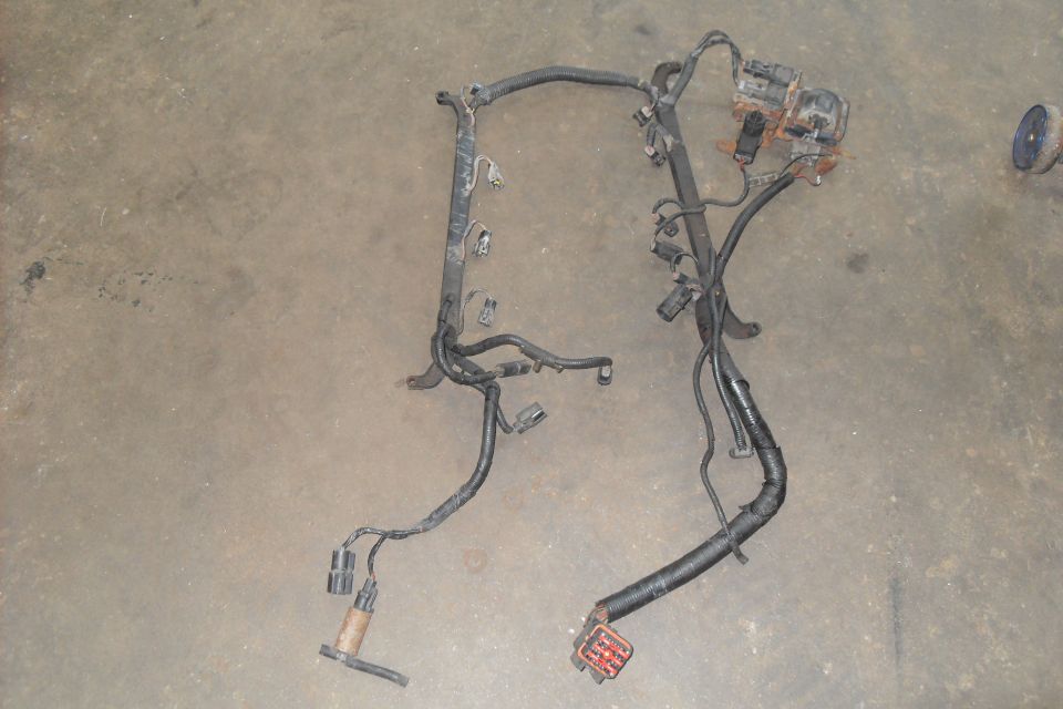 Vehicle wiring harness laid out on a concrete floor