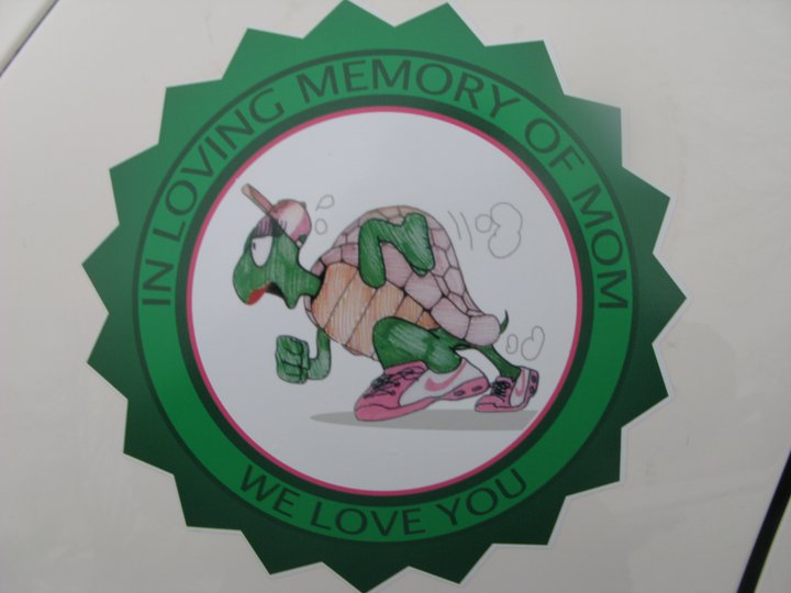 sticker with cartoon turtle wearing a hat and sneakers, text says 'IN LOVING MEMORY OF MOM WE LOVE YOU'
