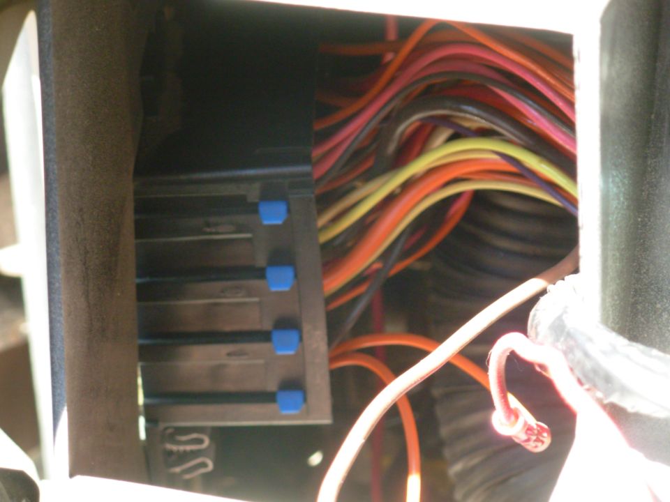 The fuse block is fairly easy to access: pull one 7mm screw, slide the box in & down, and rotate for access to the blue retainer bar (other side).  Pull the retainer out, install/remove terminals as needed, replace the retainer, and reinstall the box.

SEE THE PREVious PICs...
