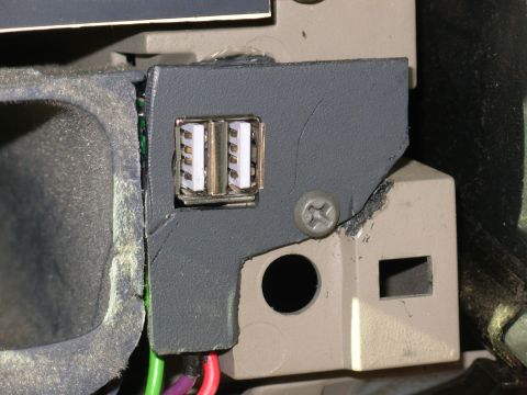 1997 Chevrolet Silverado 3500 - I scavenged some plastic from a junkyard dash & used it to make a mounting plate, then screwed it to the dash shell. The back of the socket…