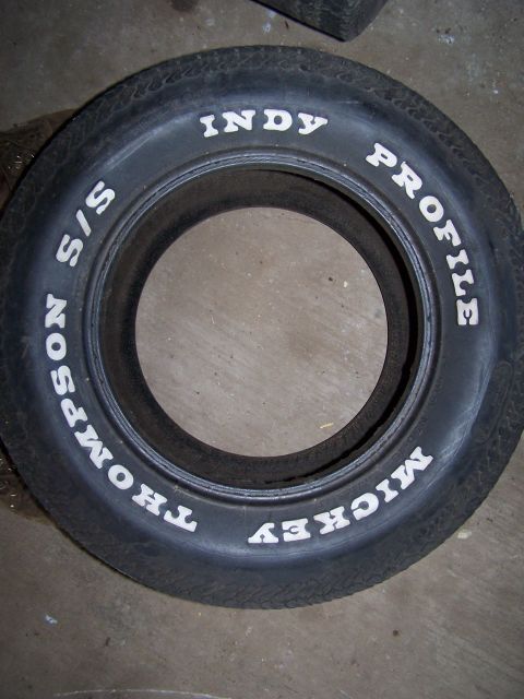 1900 Acura CL - A tire with white lettering is shown, indicating "INDY PROFILE S/S THOMPSON MICKEY".