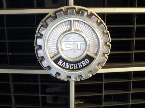 1973 Ford Ranchero - Close-up of the 1973 Ford Ranchero emblem, indicating the vehicle's year and model.