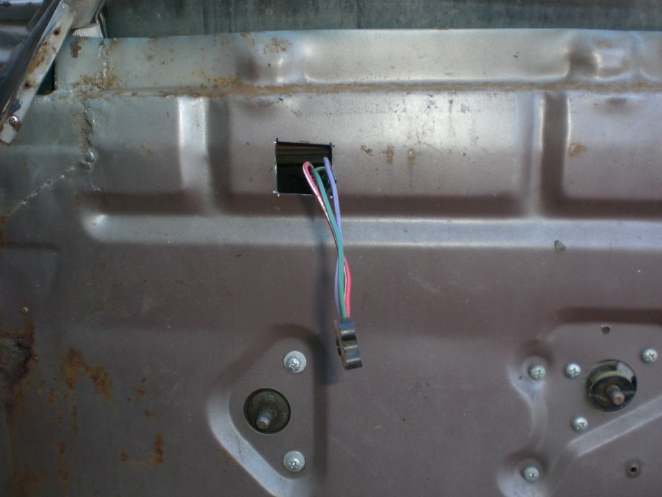 Once you decide where to mount the switch you will need to cut the hole in the door panel then transfer the hole to the steel inner panel and cut a hole for the wires.
