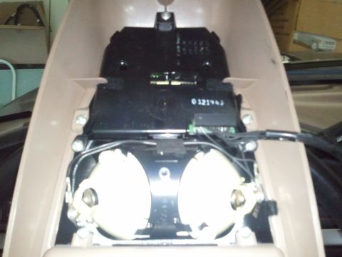 1994 Ford Bronco - Close-up view of the internal components of a vehicle's overhead console.