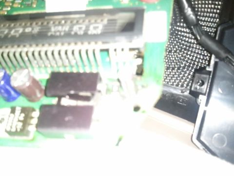 1994 Ford Bronco - Detail of an electronic circuit board, likely from a vehicle's overhead console, showing various components.