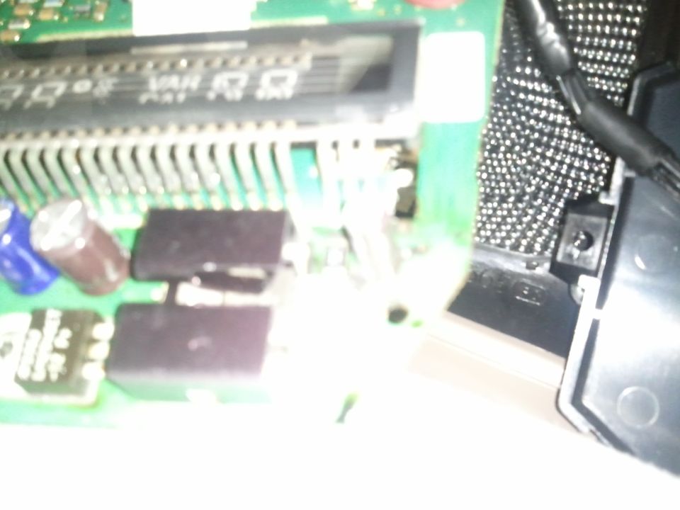 Close-up of electronic circuit board with capacitors and transistors