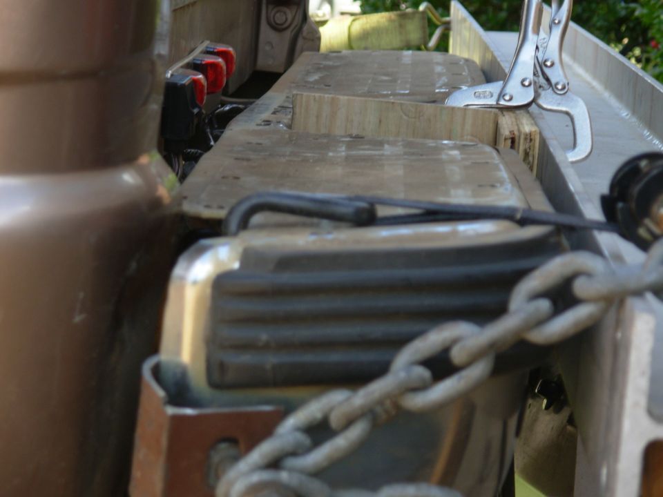 This is the 2nd pull with 2 shims, and it's just past straight.  The end hook was pulling a little too hard, so I added the black ratchet strap to distribute the load.