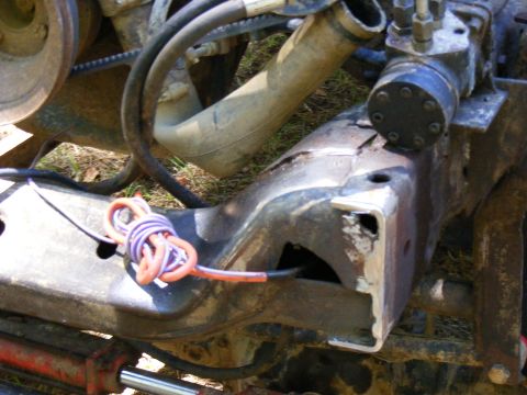 1978 Ford Bronco - Close-up view of engine and frame components with visible wiring.