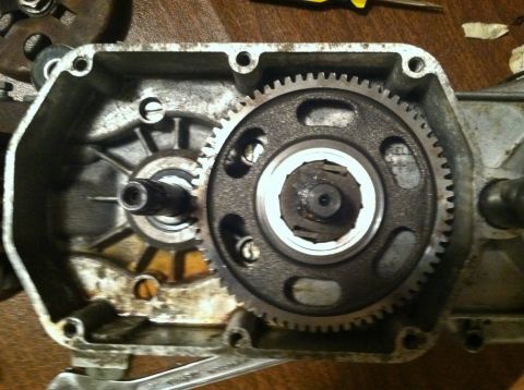 1981 Garelli Rally Sport - The internal gears of a moped transmission are shown, with a wrench resting beneath the casing.