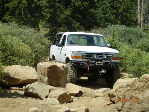 1996 Ford Bronco - This 1996 Ford Bronco navigates a challenging rocky trail with its front end lifted.