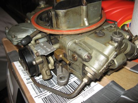 1968 Shelby GT500 - Close-up of a Holley carburetor, identified by an Autolite tag, likely for a classic car.