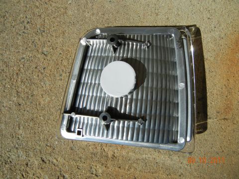 1996 Ford Bronco - This is a close-up view of a vehicle's turn signal assembly, showing its internal ribbed design.