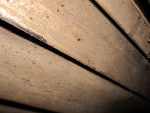 1991 Ford LTD Crown Victoria - The image shows a close-up view of parallel metal slats, suggesting a structural element rather than a vehicle.