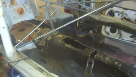 1978 Ford Mustang II - Interior view of a car undergoing restoration, focusing on the floor and central tunnel area.