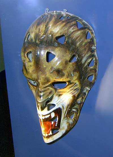 1999 Ford Crown Victoria - This custom-painted goalie mask features a fierce feline design with bared teeth and piercing eyes.