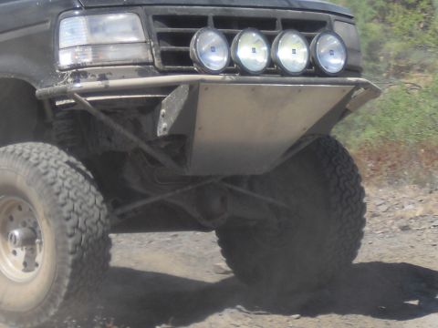 1986 Ford Bronco - This off-road truck features a custom bumper and auxiliary lights, suggesting a build from the 1980s.