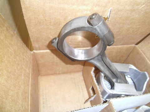 1991 Chevrolet Blazer - Engine connecting rod and piston assembly shown inside a cardboard box, with "Supermotors.net" visible at the bottom.