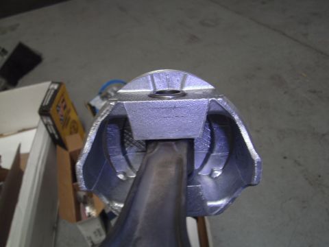 1991 Chevrolet Blazer - Close-up view of a piston and connecting rod, likely for an engine rebuild project.