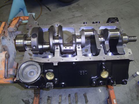 1991 Chevrolet Blazer - Engine block and crankshaft assembly on an engine stand, ready for further work.