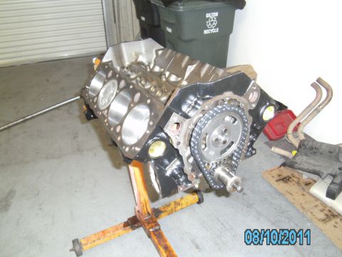 1991 Chevrolet Blazer - Engine block assembly on a stand, showing the timing chain and gears.
