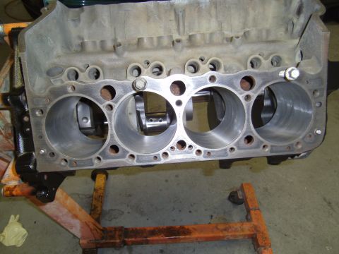 1991 Chevrolet Blazer - Close-up view of an engine block on an engine stand, showing the crankshaft and cylinder bores.