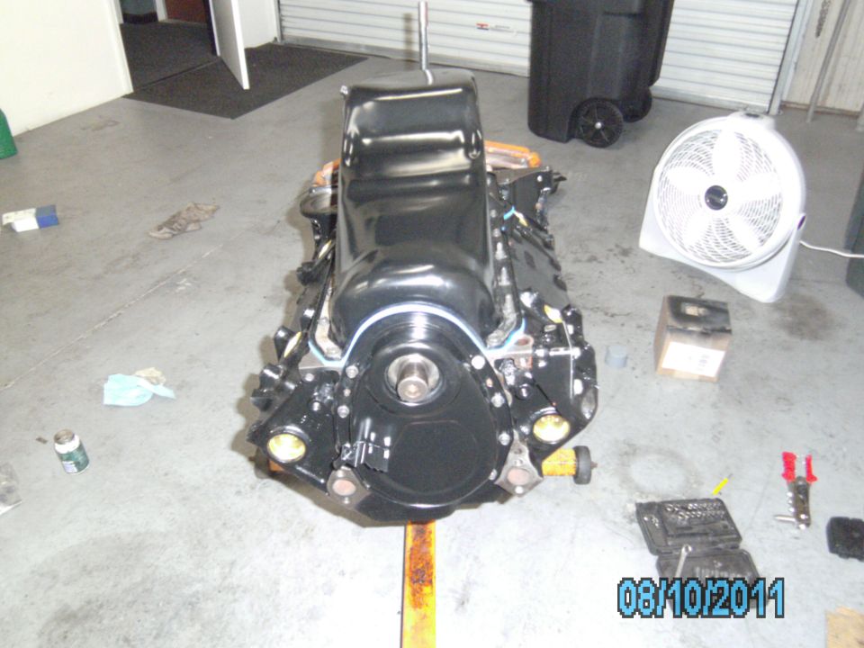 Black engine on stand, front view