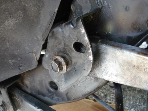 2000 Ford Crown Victoria - This photo shows a close-up of a vehicle's rear suspension mounting bracket, not a specific model year.