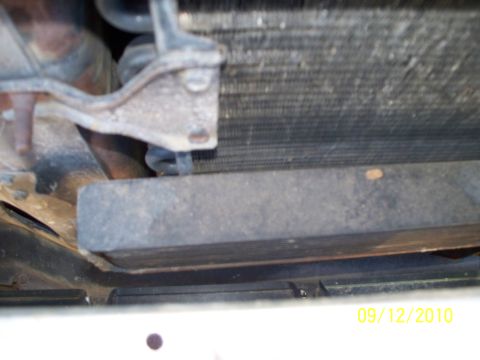 1979 Ford F-250 - The image shows a close-up view of a vehicle's radiator and its support structure, with a date stamp indicating it was taken on September 1…