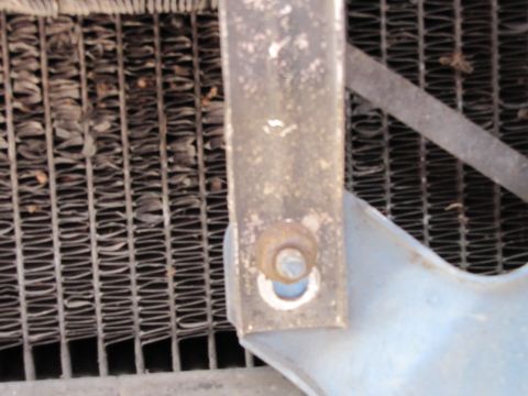 1993 Ford F-250 - Radiator and mounting bracket detail, likely from an older truck.