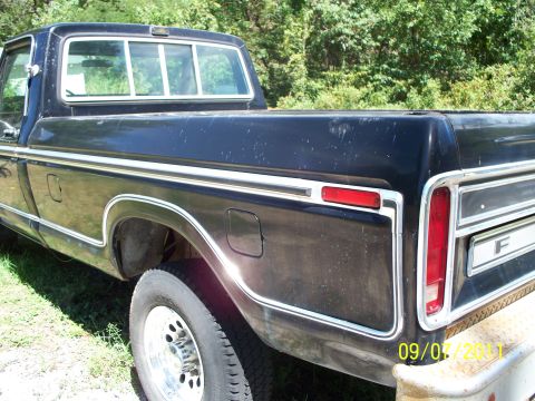 1979 Ford F-250 - This pickup truck is parked outdoors with trees in the background. The date 09/03/2011 is visible.
