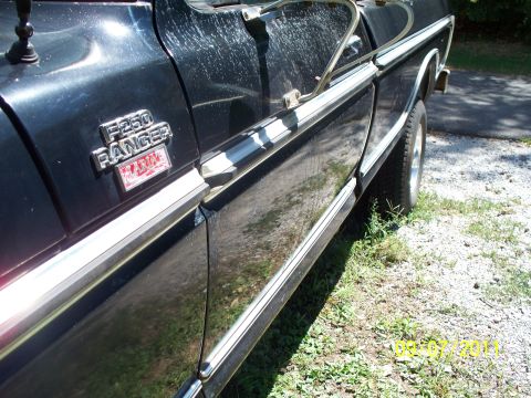 1979 Ford F-250 - Side view of a 1979 Ford F-250 Ranger XLT showing the door and fender trim.