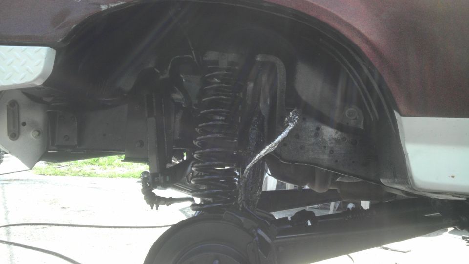1989 Ford Bronco front suspension and wheel well detail