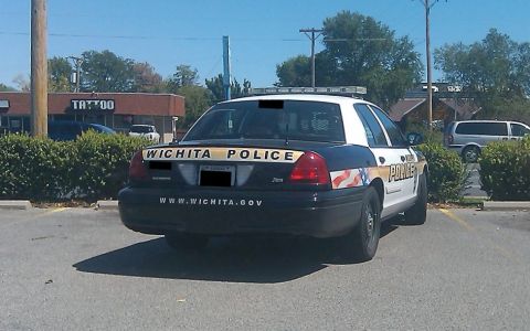 2000 Mercury Grand Marquis - A Wichita Police Department vehicle is parked in a lot, displaying the department's name and website on its rear.