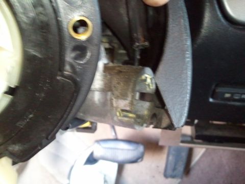 1994 Ford Bronco - This photo shows the internal components of a steering column, specifically the clock spring assembly.