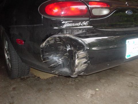 1999 Ford Taurus - Well...my first accident....backed into a tree IN THE INSURANCE COMPANYS LOT!!! They had just taken pictures of the car and when i went to…