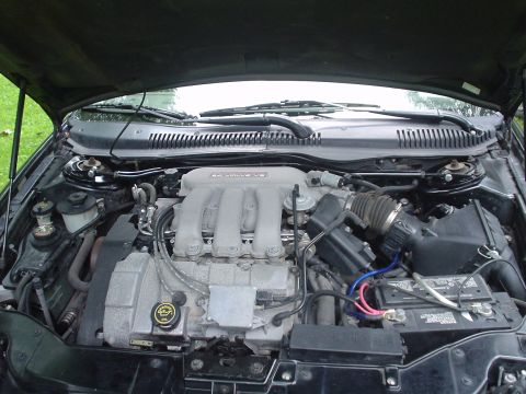 1999 Ford Taurus - This is a picture of my engine bay. In the back you will see the FSTB (front Strut Tower Bar) from Anonda Motorsports. It helped alot with…